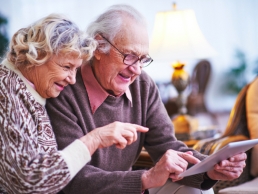 elderly couple with a tablet, coronavirus, technology