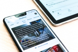 A Google pixel 3XL showing Covid-19 information from the Google News app