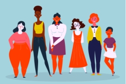 Diverse international and interracial group of standing women, women empowering women