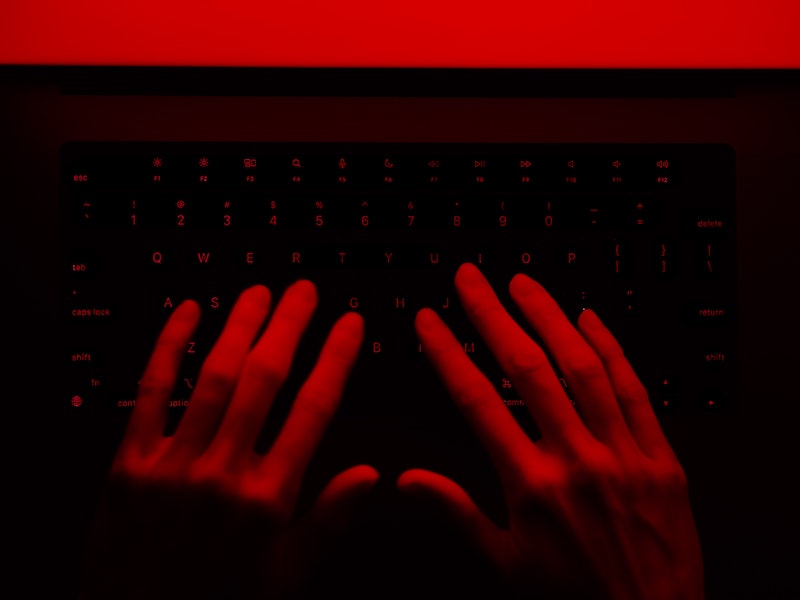 Woman typing on keyboard, woman in cyber
