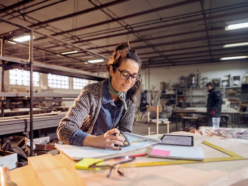 Generic image showing a female engineer in a workshop