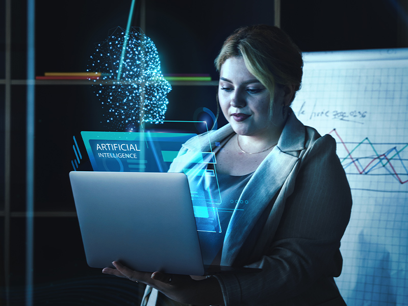 Woman using AI on laptop